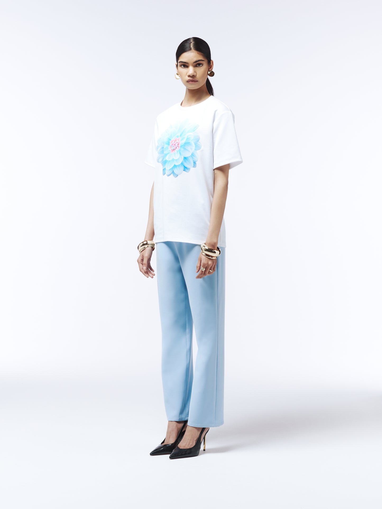 Soft blue cotton tee featuring oversized pastel dahlia graphic