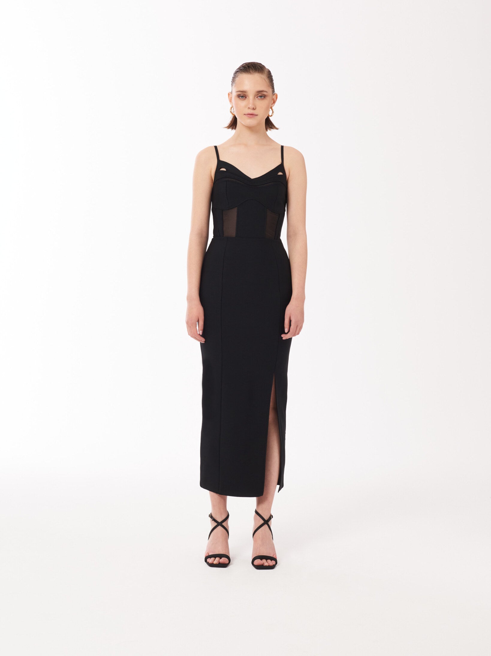 Black Bustier Mesh Binding Detail Dress with sheer tulle inserts and side slit. Designed by fashion brand Sour Figs