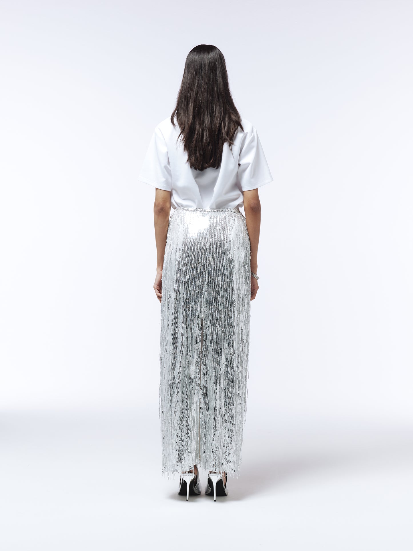Back view of SOUR FIGS Sequin Fringed Maxi Skirt showing flowing fringes