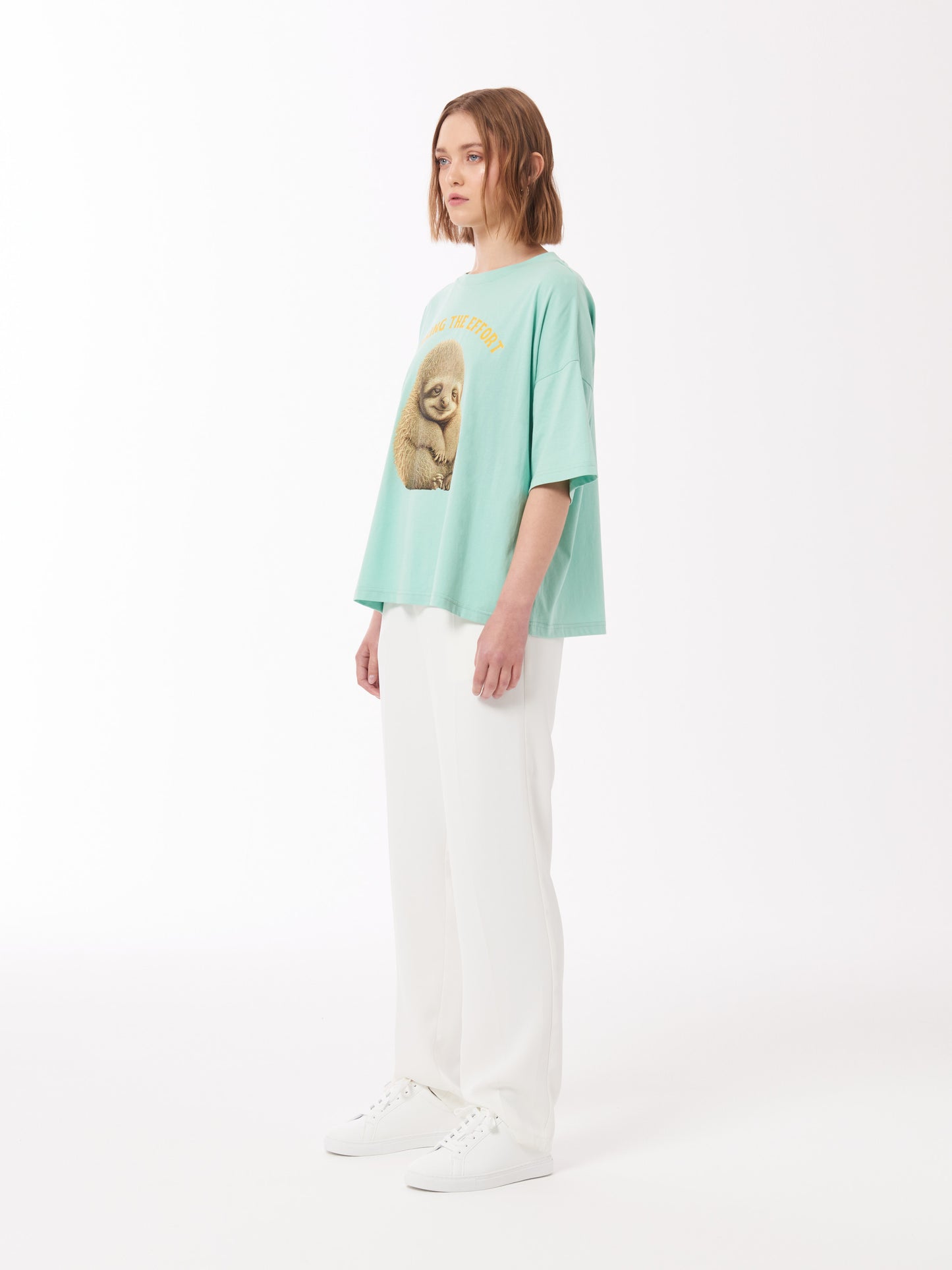 Sloth Print Unisex T-Shirt in Light Mint Green