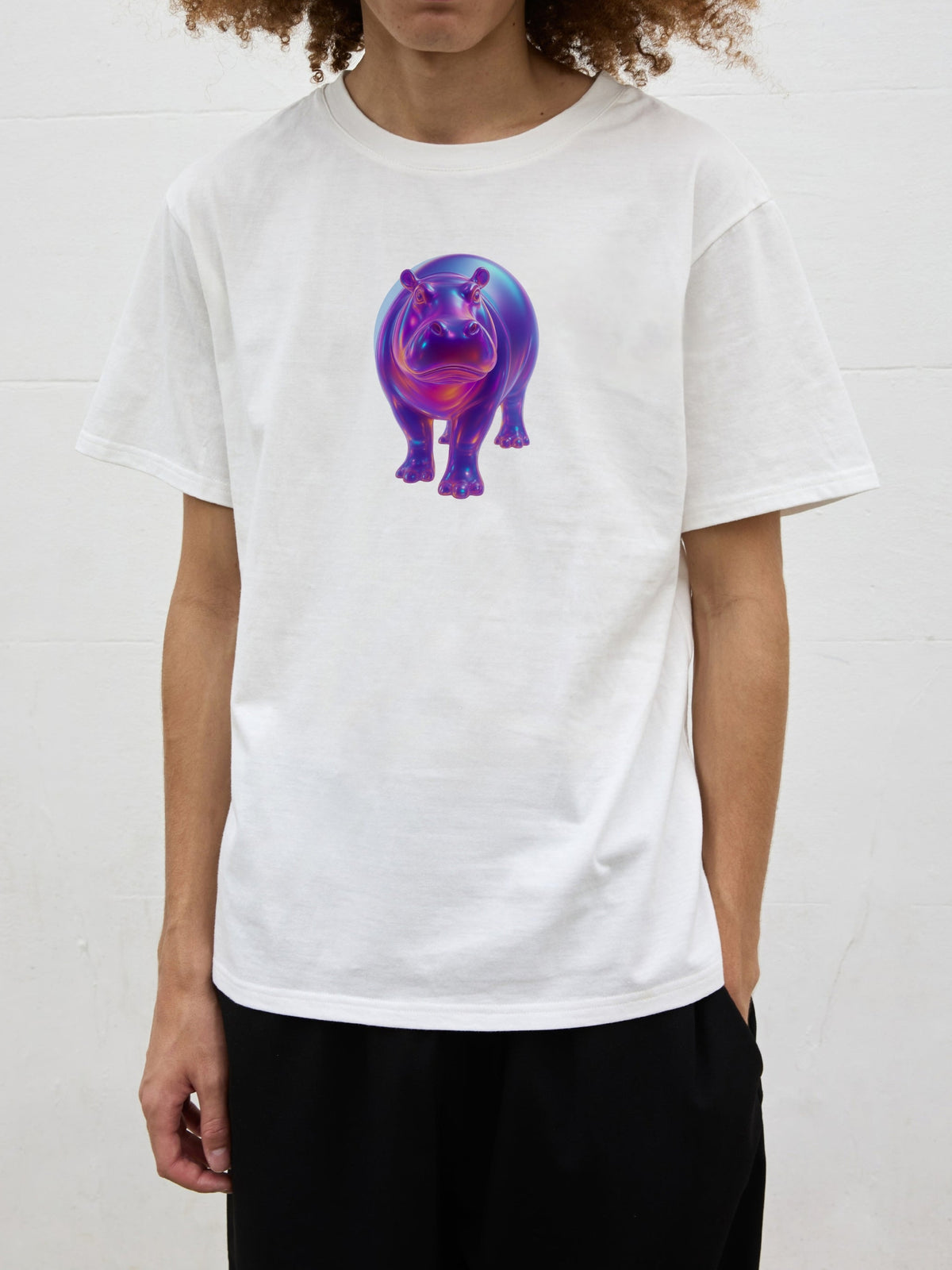 Close-up front view of the colourful hippopotamus graphic on the SOUR FIGS white cotton-blend unisex hippo print T-shirt.