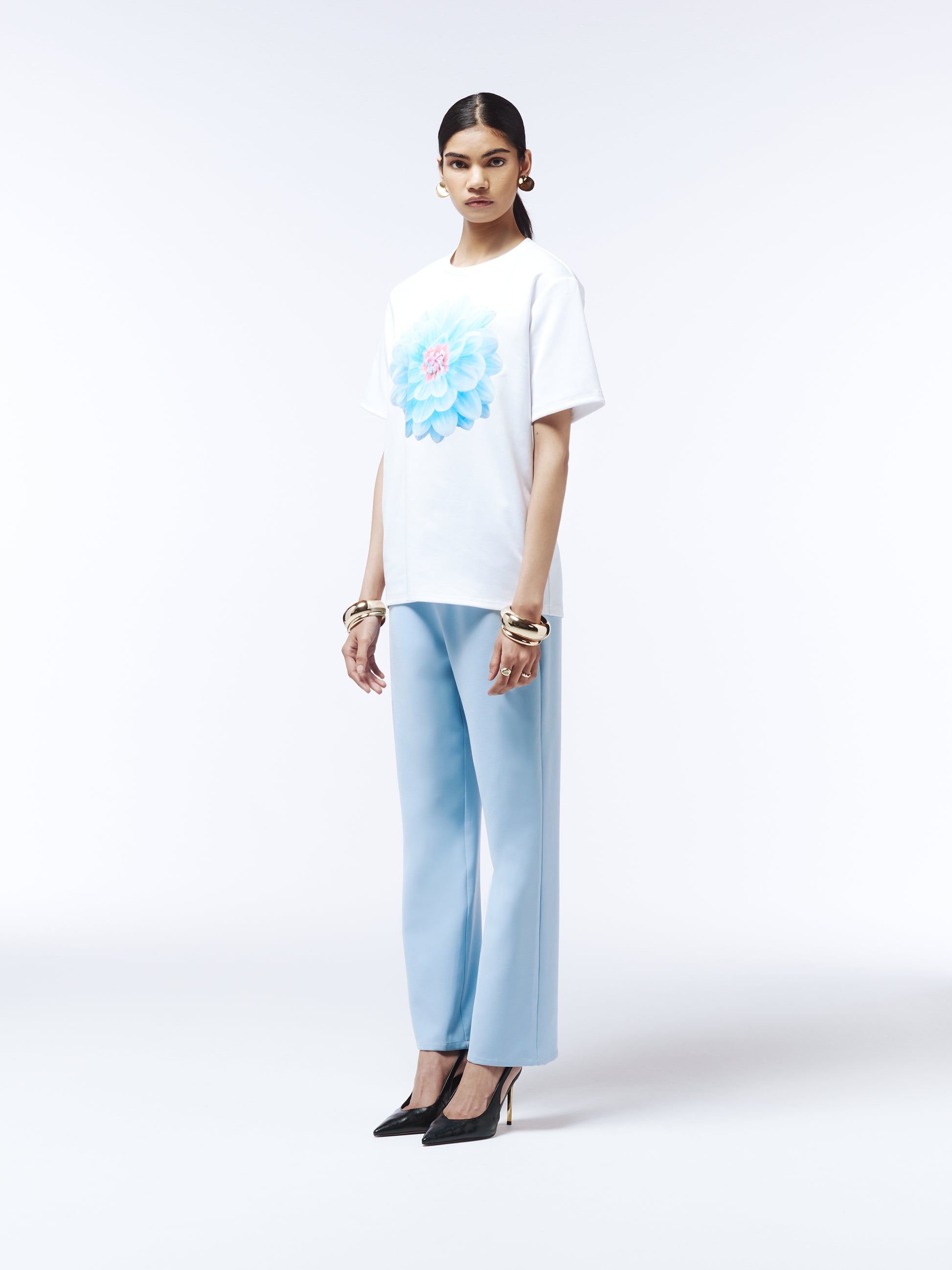 Soft blue cotton tee featuring oversized pastel dahlia graphic