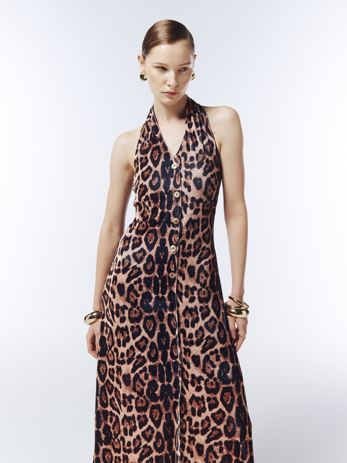 Close-up of SOUR FIGS leopard velvet halterneck dress in warm caramel brown tones