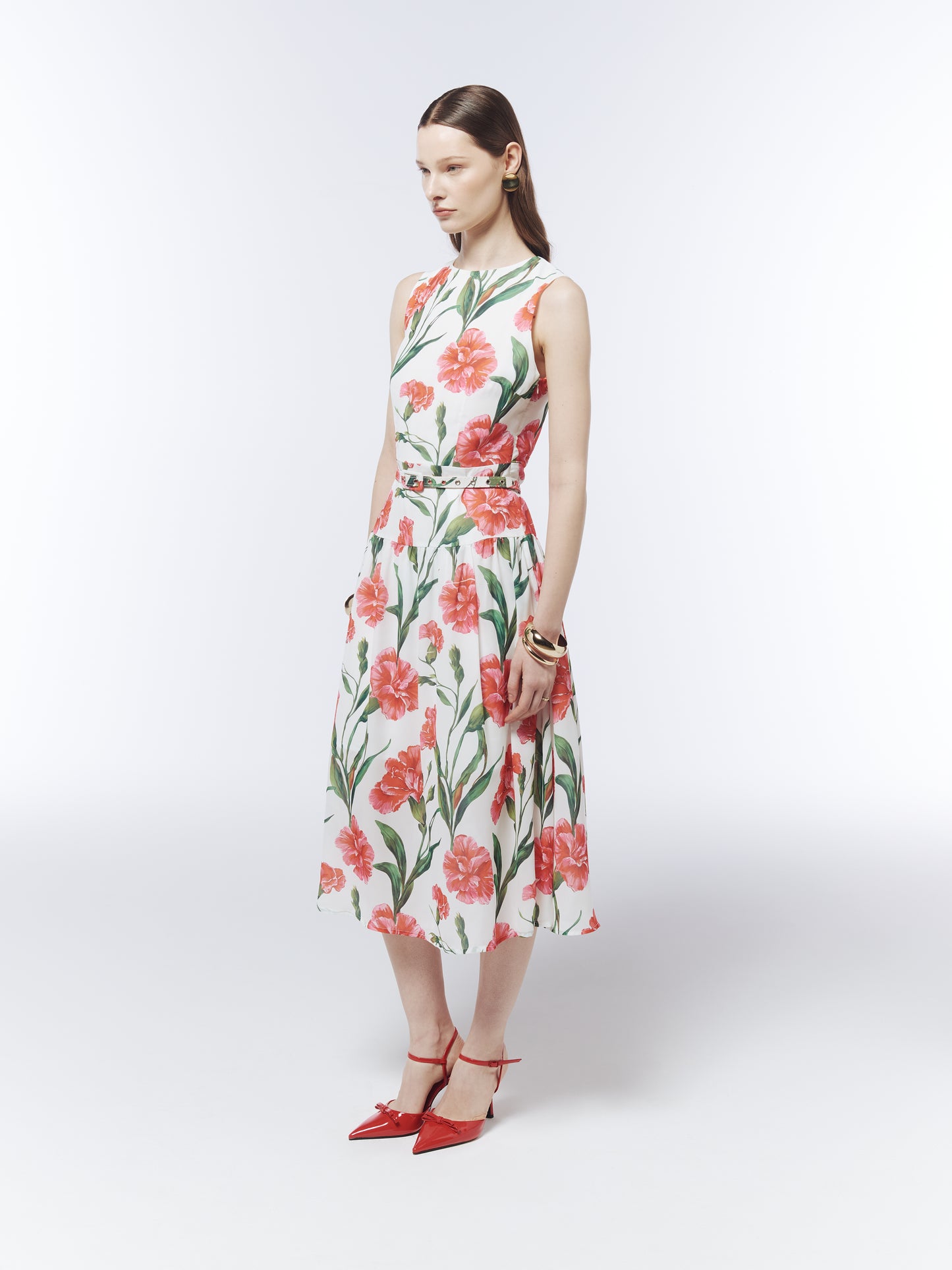 Side view of the SOUR FIGS Porcelain White carnation print dress styled for weddings and summer events.