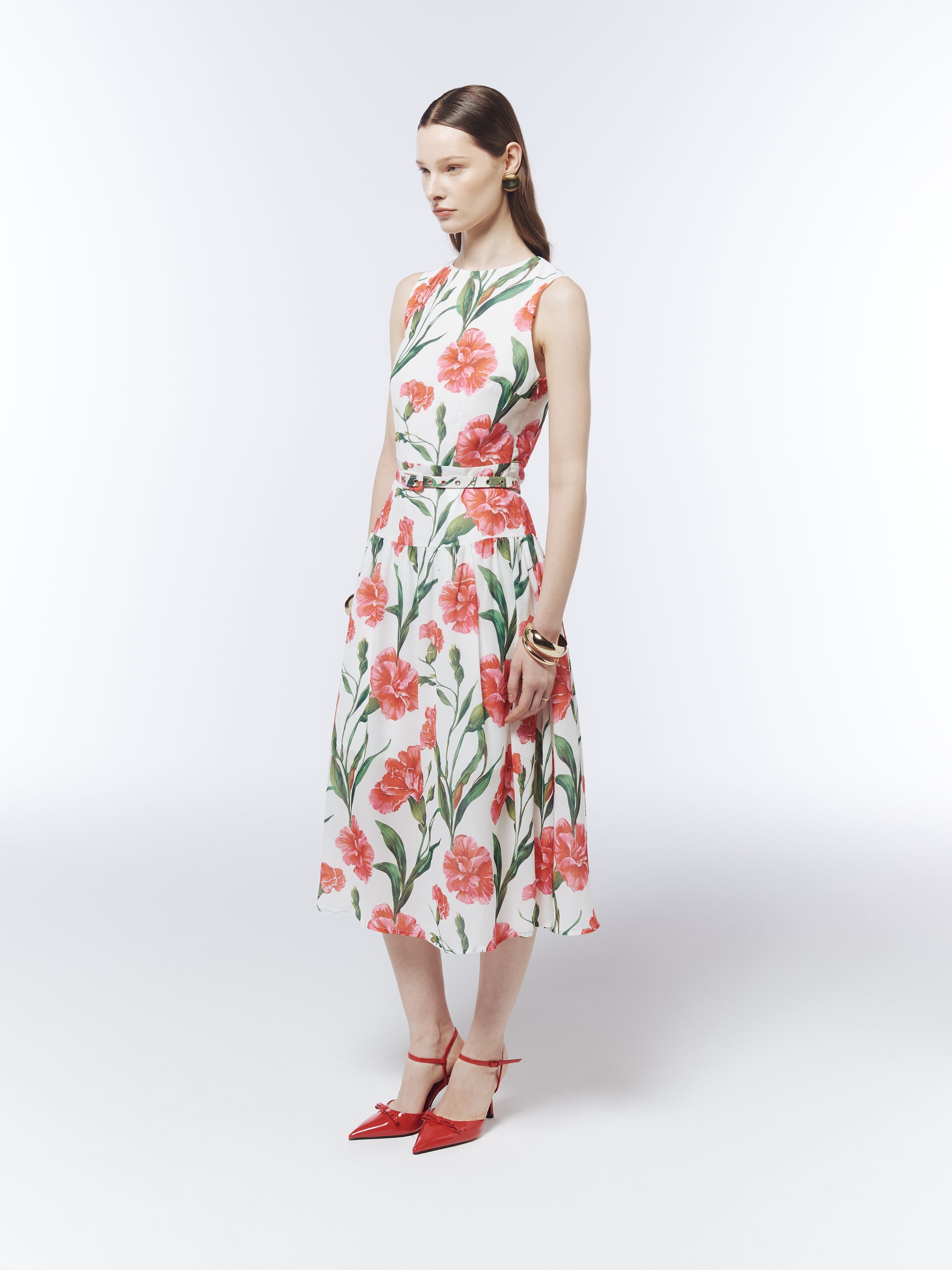 Side view of the SOUR FIGS Porcelain White carnation print dress styled for weddings and summer events.