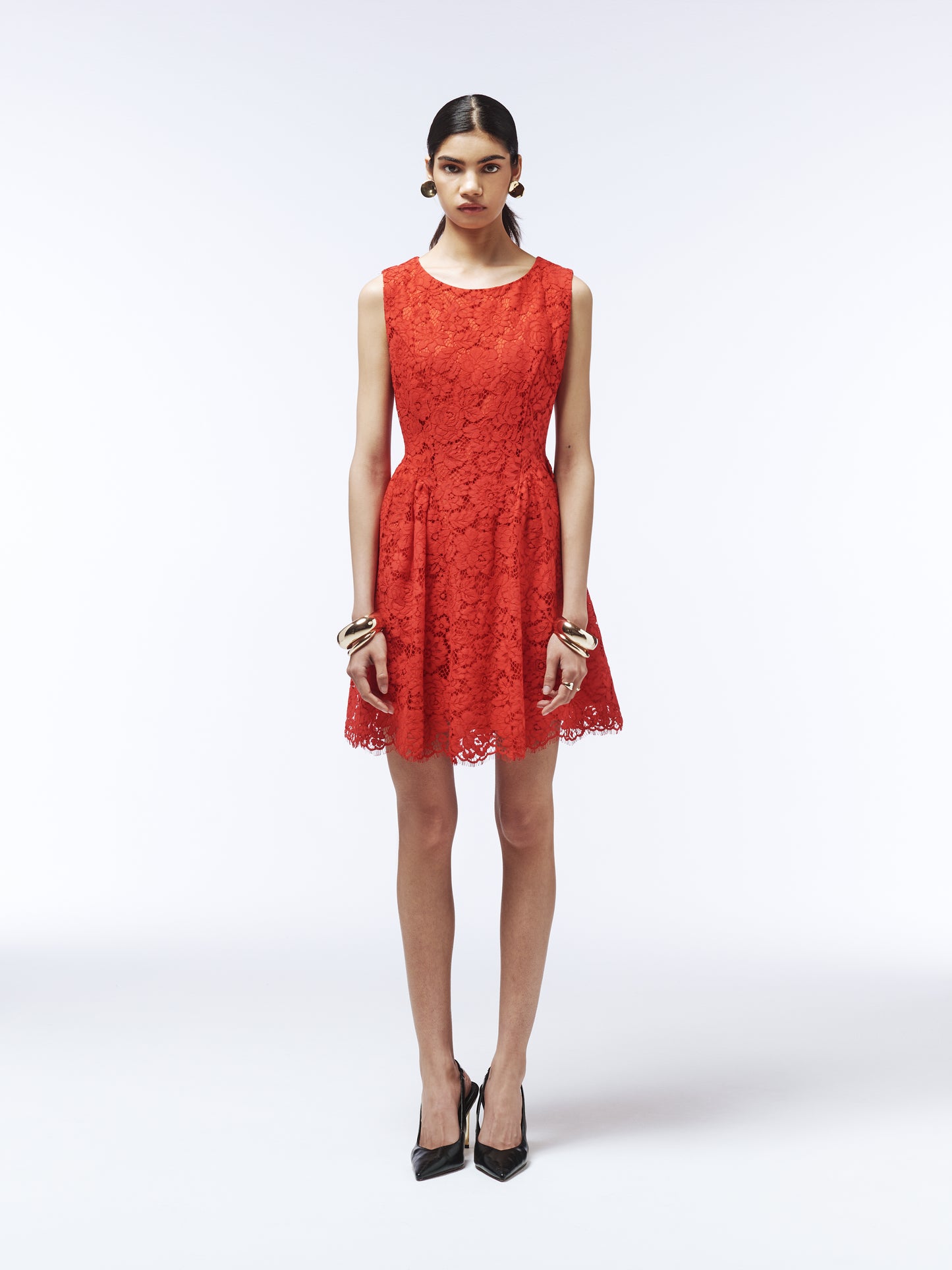 Sleeveless cherry red lace mini dress with floral detailing by SOUR FIGS