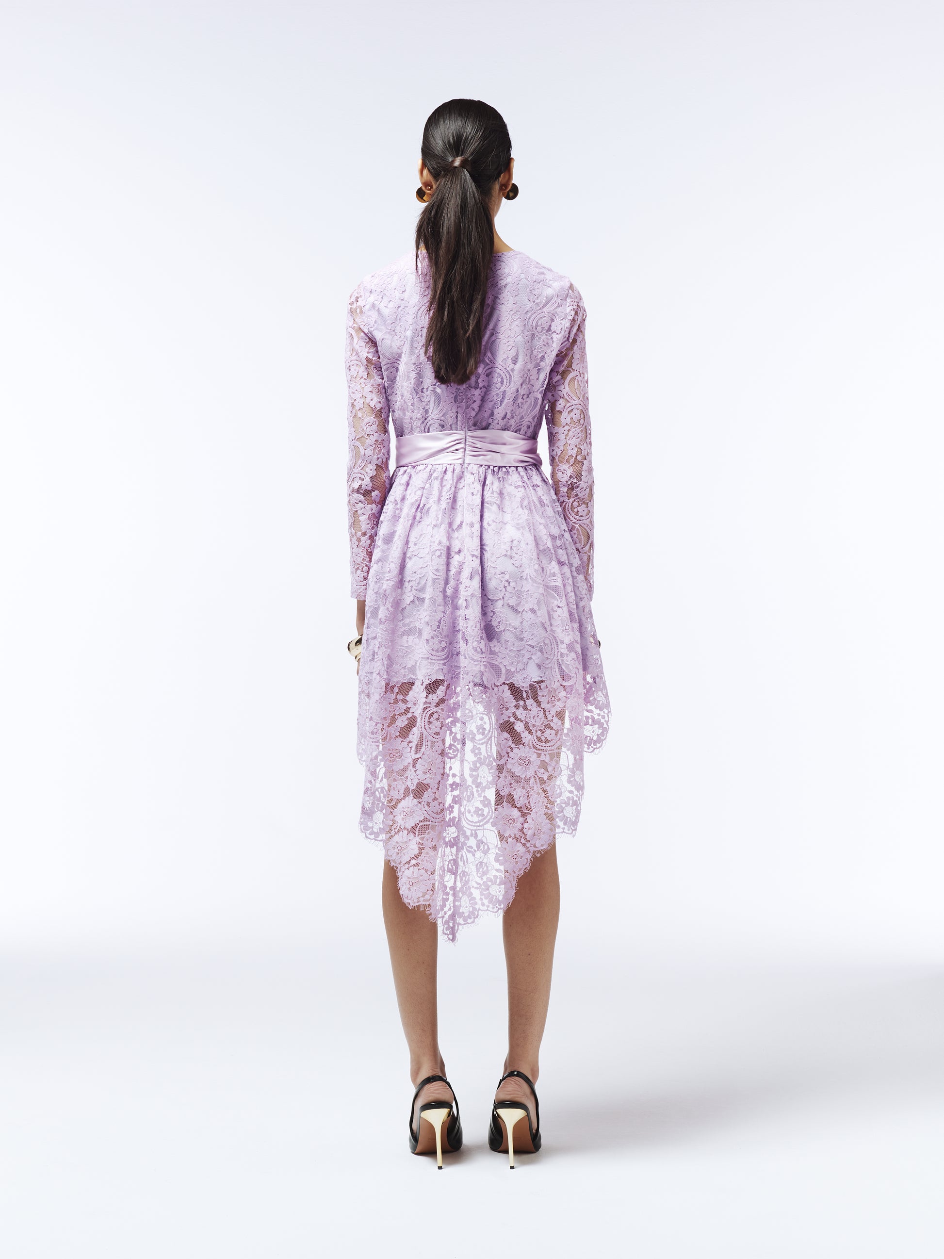 Elegant lilac lace party dress with floral detailing and waist-defining satin sash by SOUR FIGS.