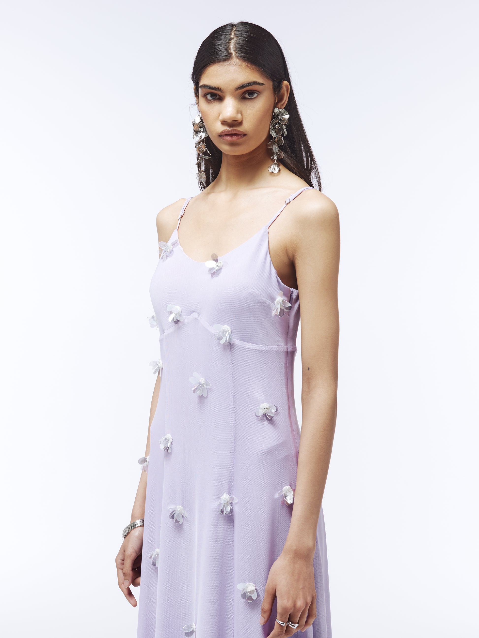 Side view of wisteria-hued dress with delicate sequin appliqué blooms