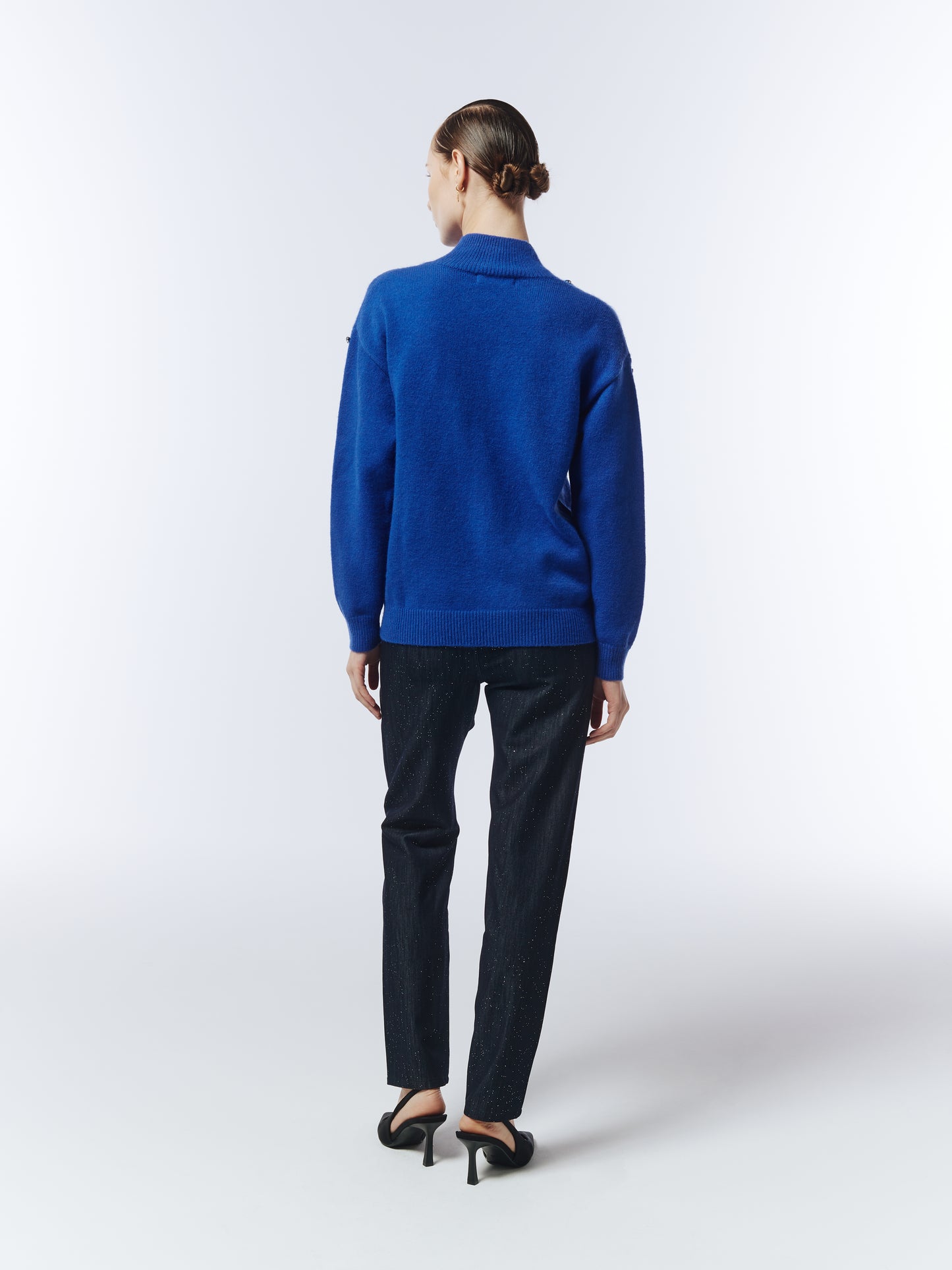 Back view of sapphire blue embellished jumper showing relaxed fit and ribbed hem by Sour Figs.