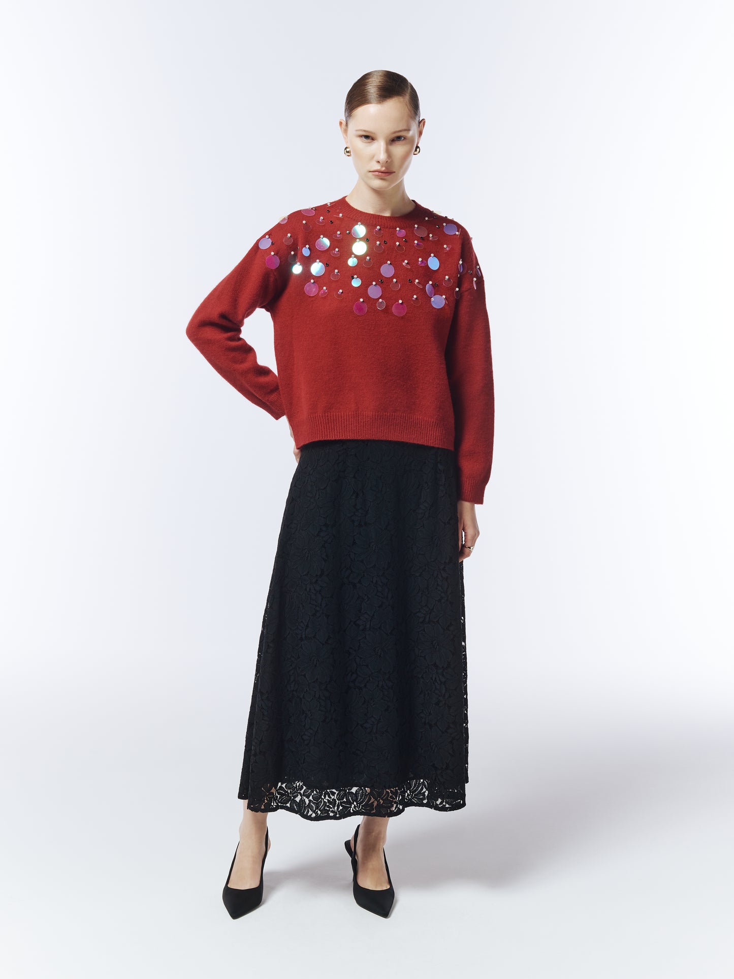 Front view of red embellished jumper from SOUR FIGS showing oversized sequins.