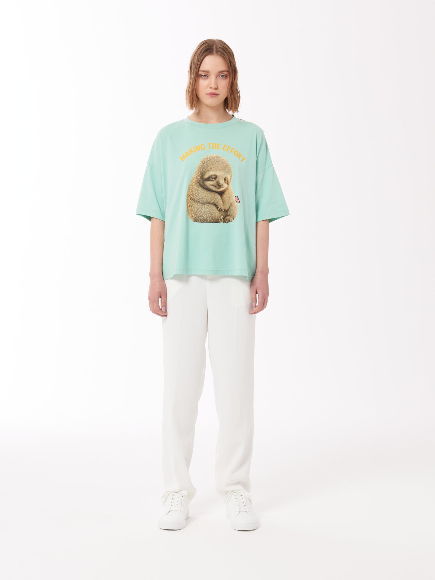 Sloth Print Unisex T-Shirt in Light Mint Green