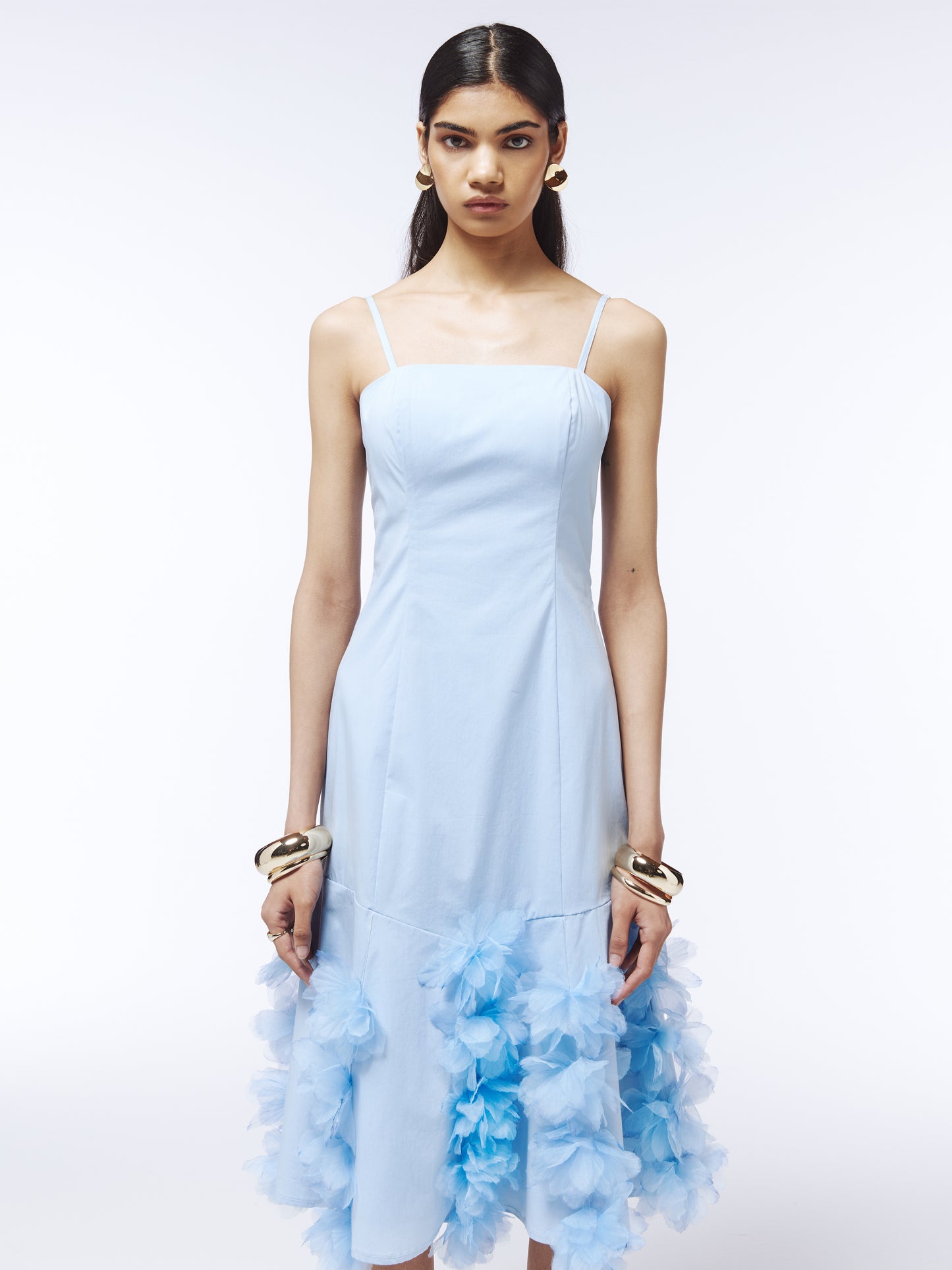 Elegant light blue dress from SOUR FIGS with dimensional floral trim and soft watercolour-style petal accents.