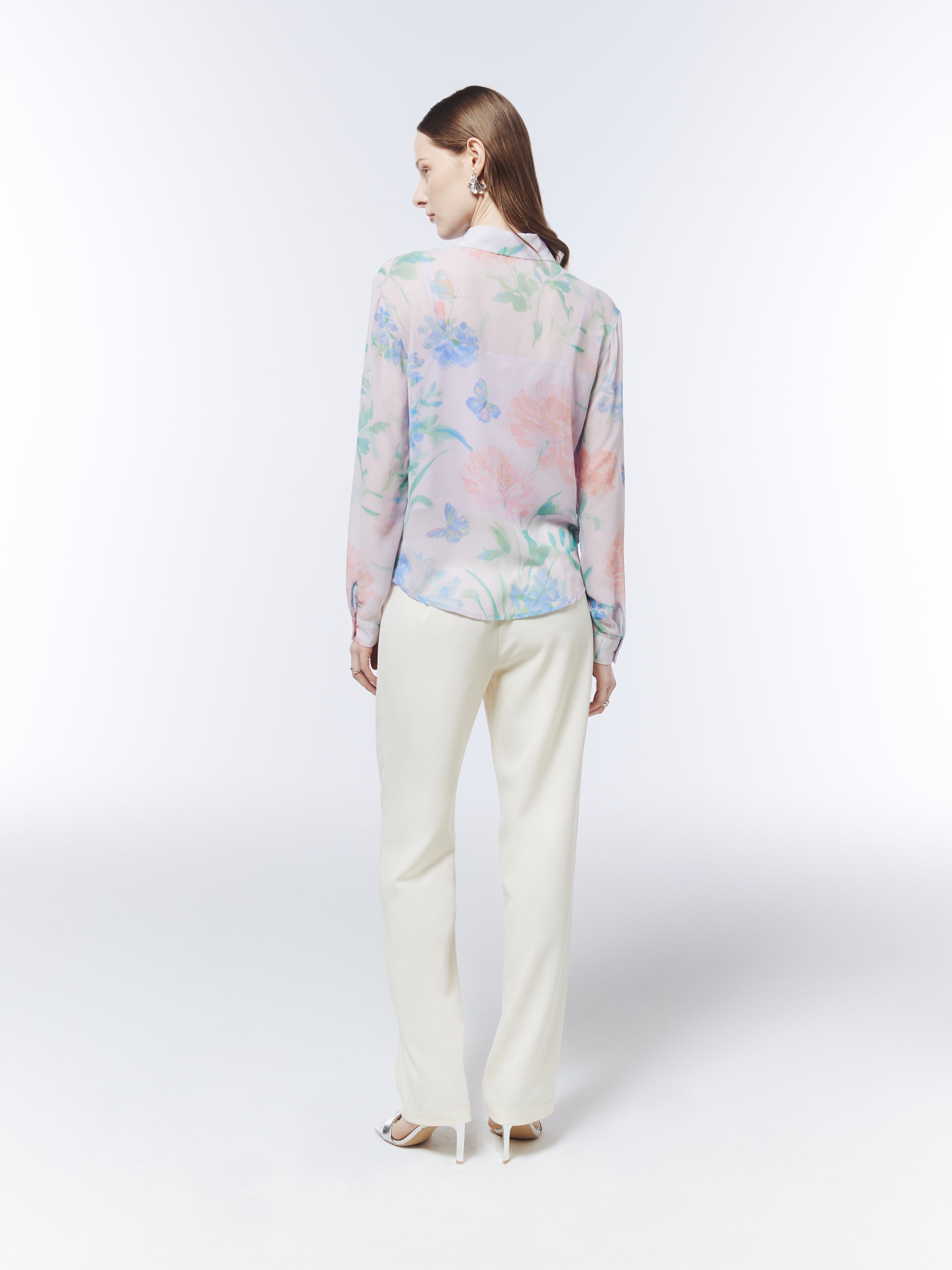 SOUR FIGS Petal Mist Lilac blouse styled with cream trousers, featuring a soft botanical print and semi-sheer outer layer.