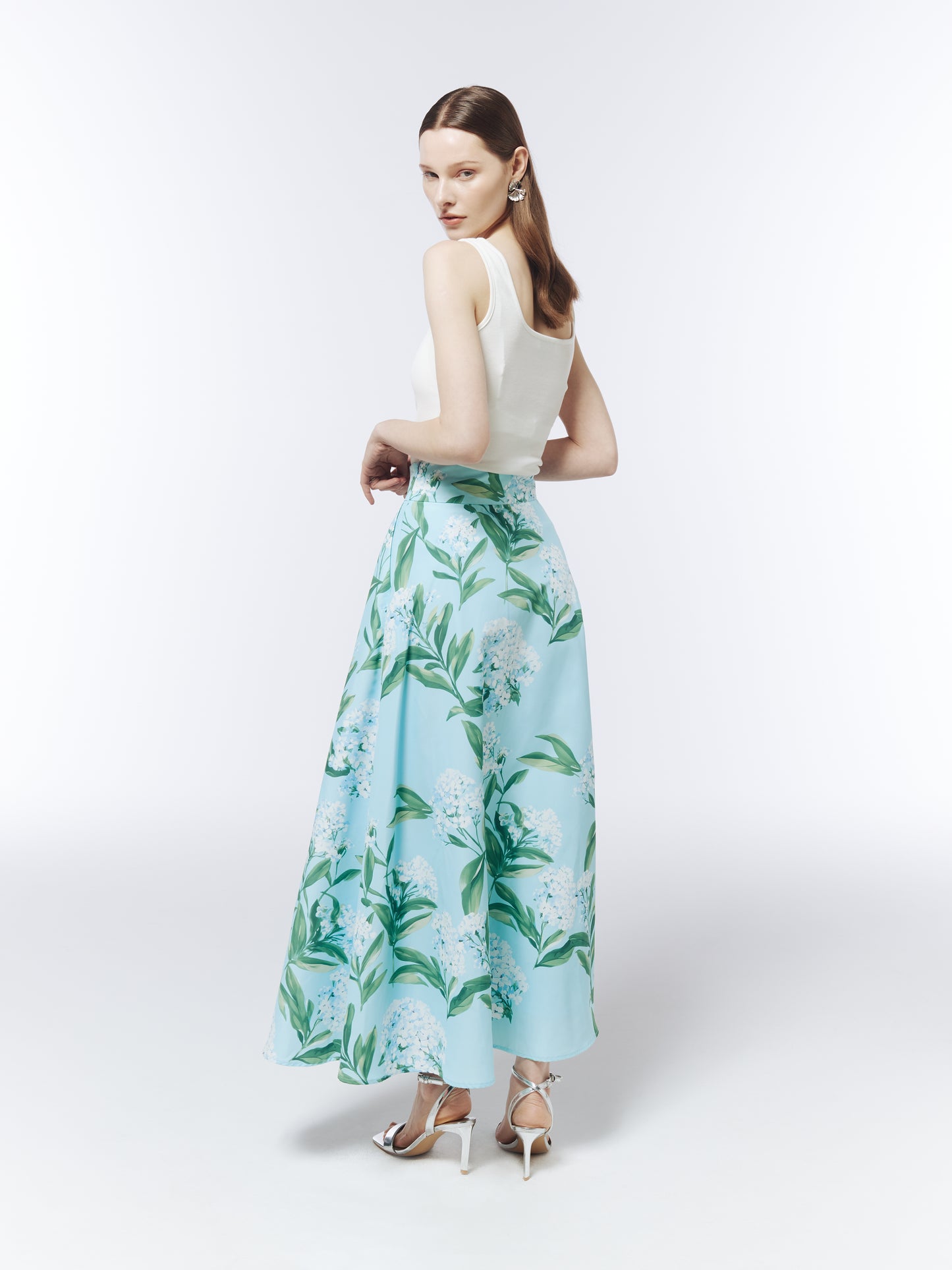 SOUR FIGS Sky Mist Blue skirt featuring white lilac blossoms, green stems and a clean waistband.