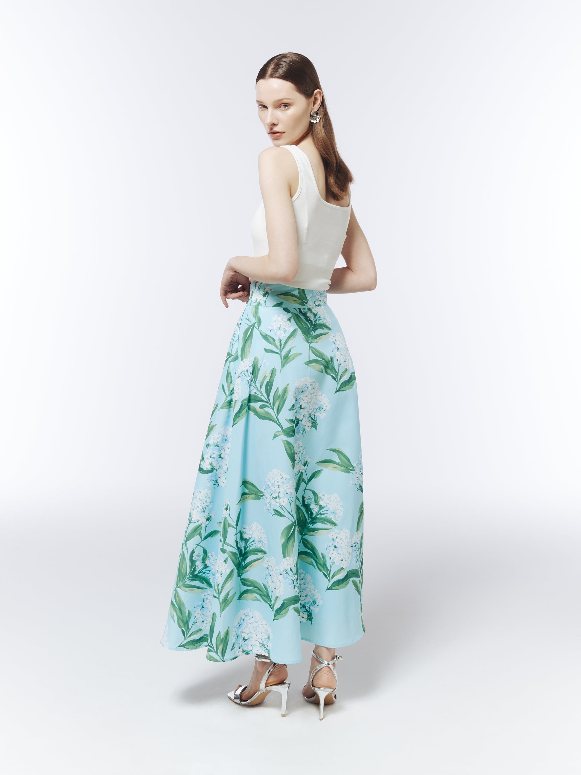 SOUR FIGS Sky Mist Blue skirt featuring white lilac blossoms, green stems and a clean waistband.