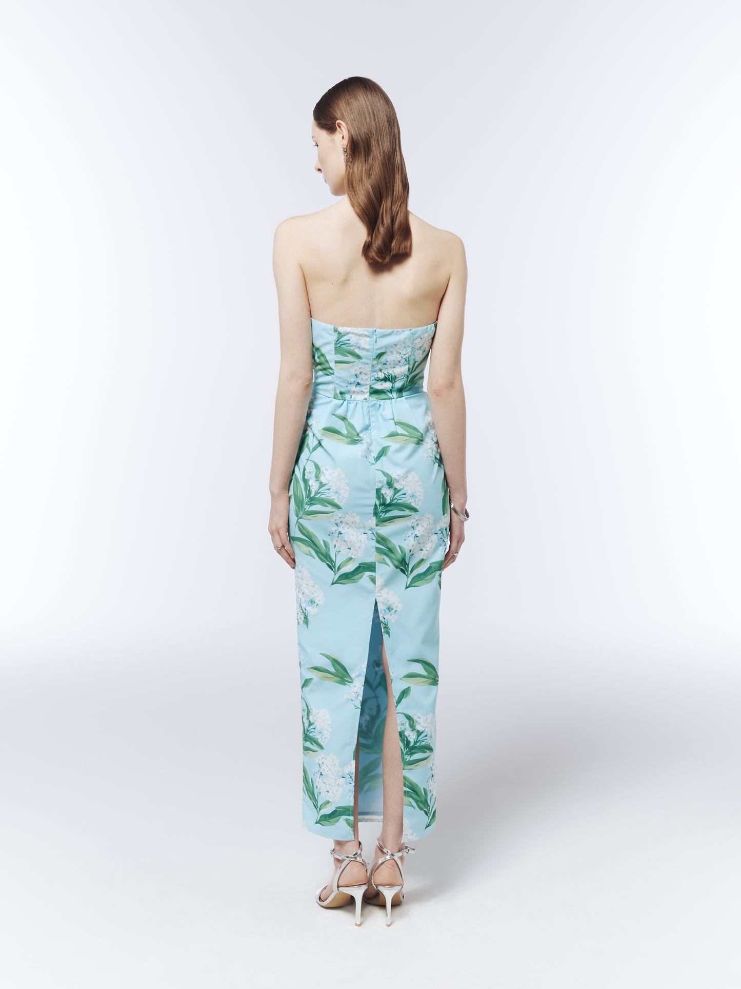 SOUR FIGS wedding guest dress in Sky Mist Blue with white lilac blossom print and back slit detail.