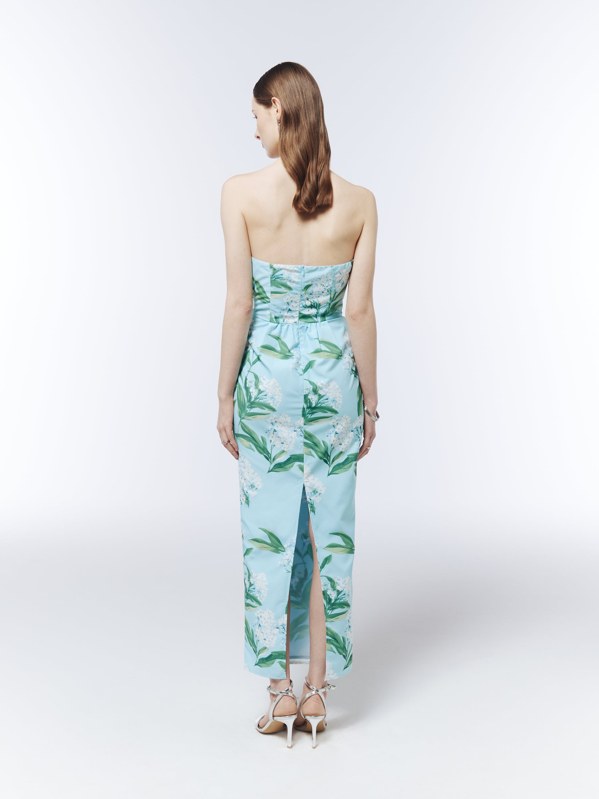 SOUR FIGS wedding guest dress in Sky Mist Blue with white lilac blossom print and back slit detail.