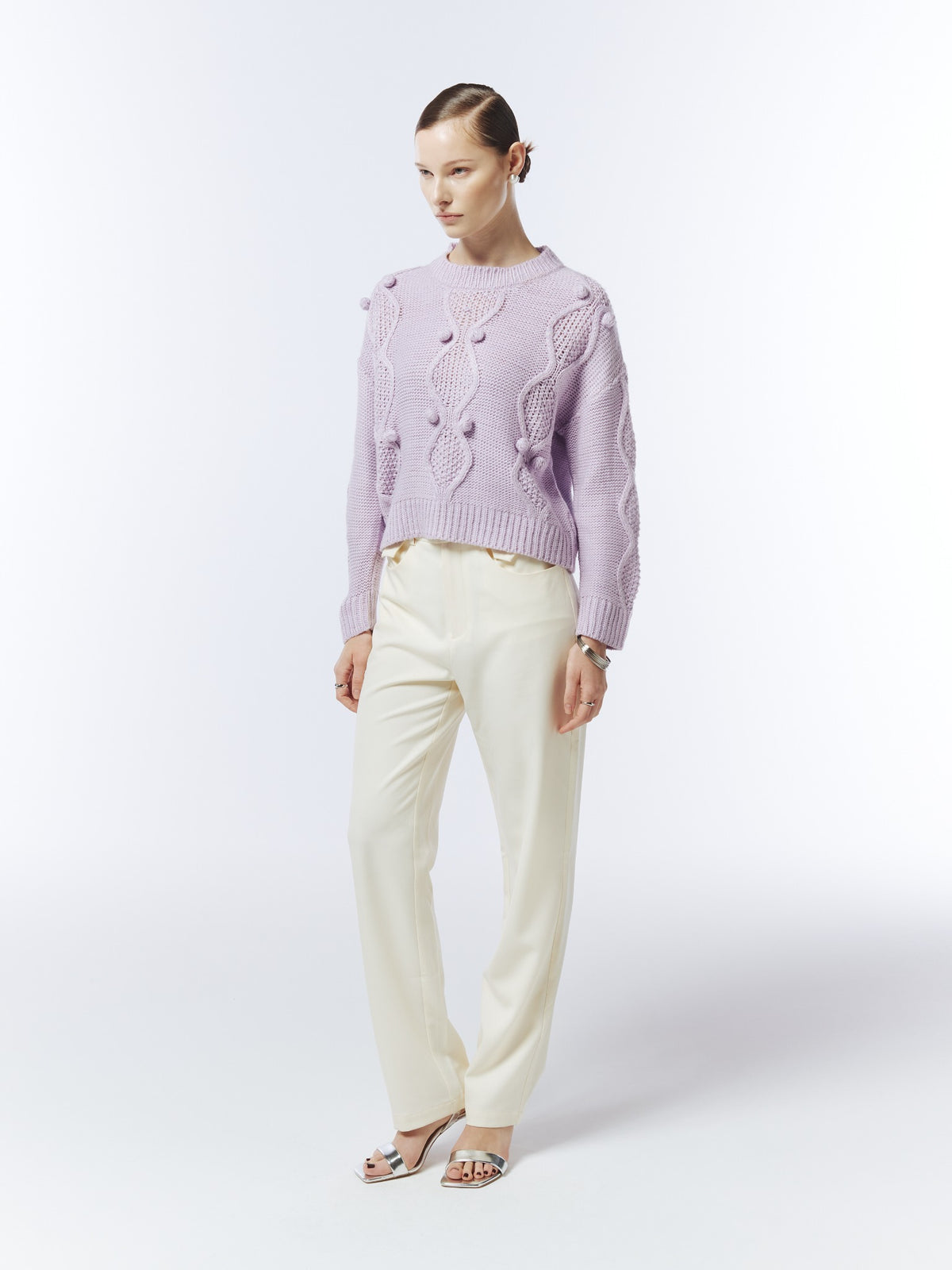 SOUR FIGS soft lilac textured knit jumper, three-quarter model view showing dropped shoulders and ribbed hem.