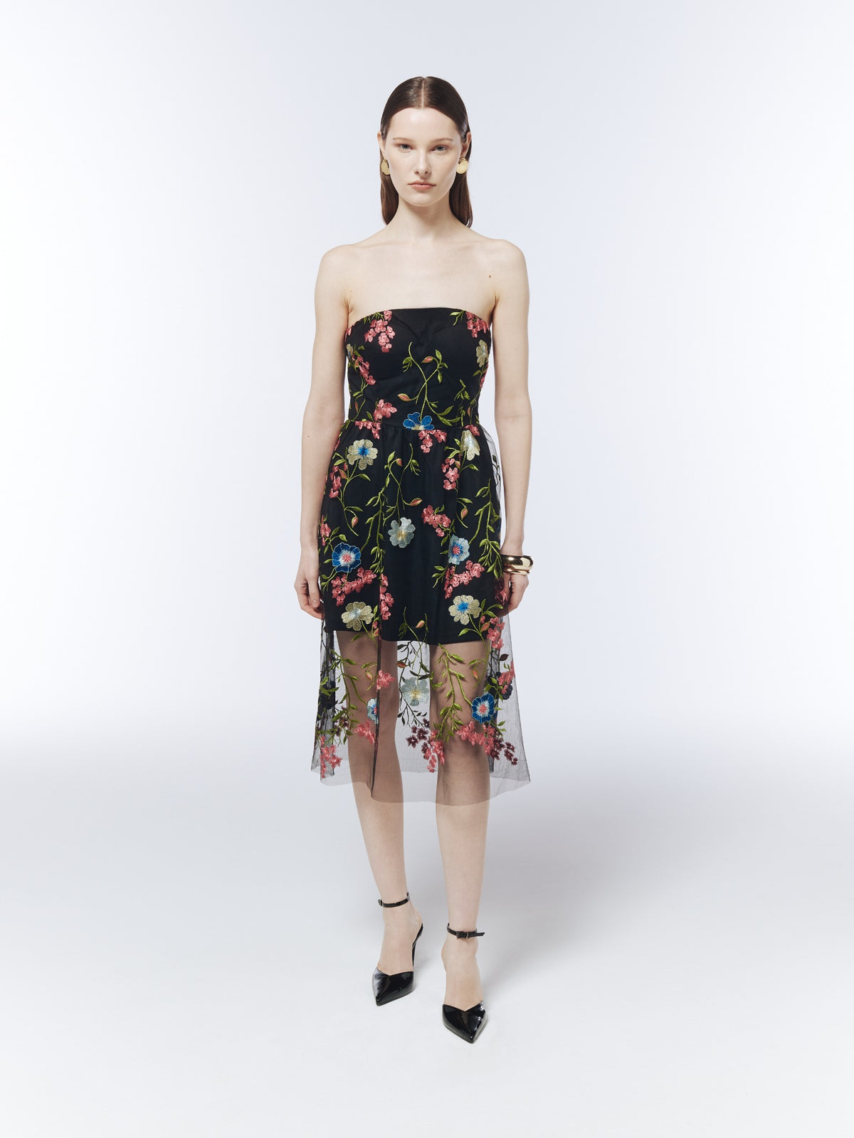 SOUR FIGS black floral-embroidered strapless midi dress, front model view showing the fitted bodice and sheer skirt over a short lining.