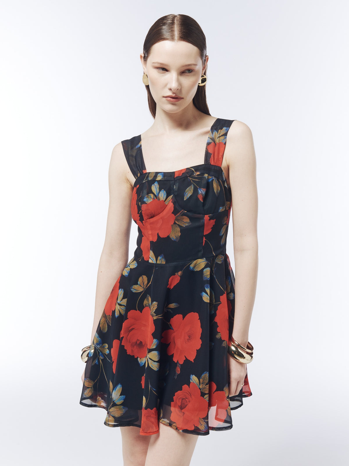 Front detail of the SOUR FIGS Floral Square-Neck Mini Dress in Midnight Rose Black, showing the shaped bodice, wide straps and rose print.
