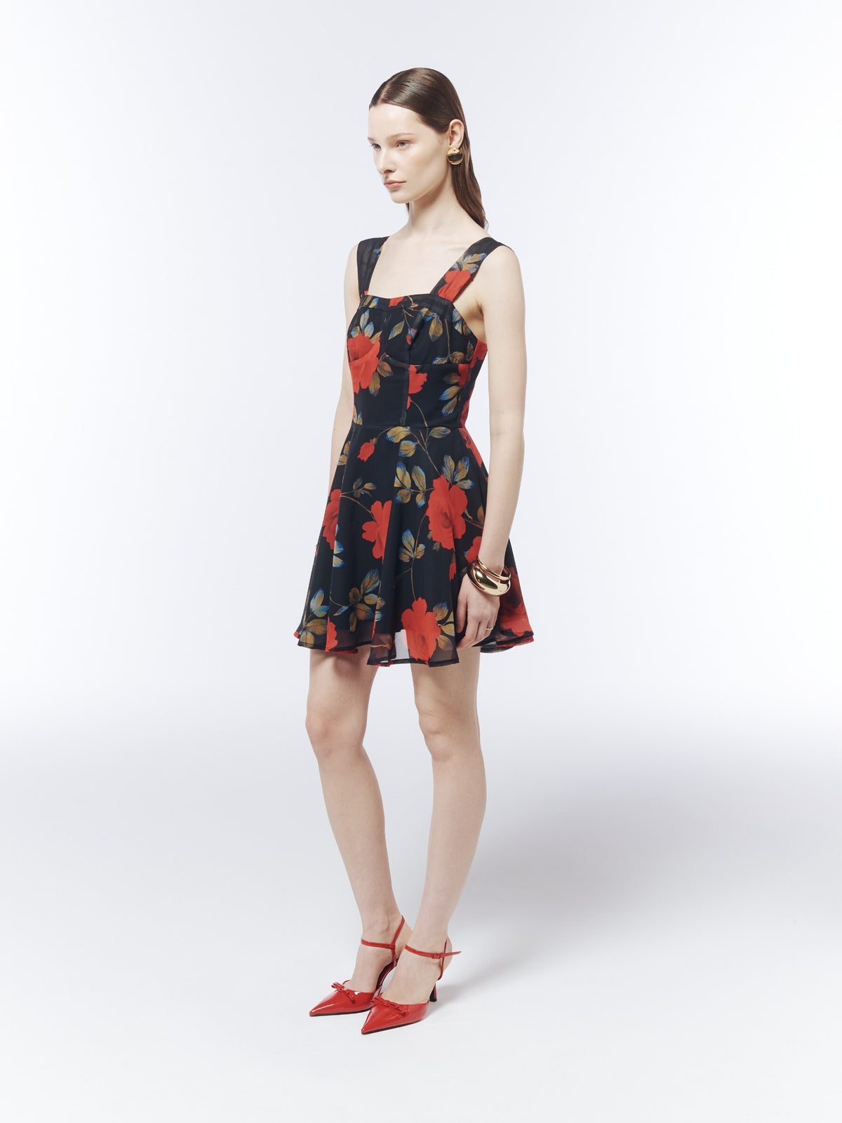 Model view of the SOUR FIGS Floral Square-Neck Mini Dress in Midnight Rose Black, showing the sleeveless cut and flared skirt.