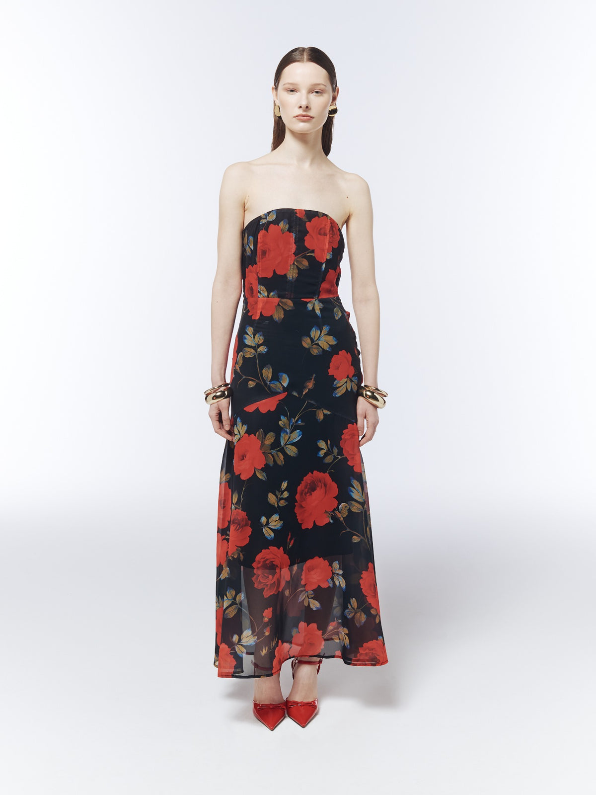 Front model view of the SOUR FIGS Midnight Rose Black floral strapless maxi dress, showing the fitted bodice and sheer lower skirt.
