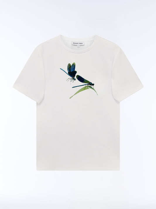 Front view of the SOUR FIGS Metallic Damselfly Print Unisex T-Shirt in White, featuring two blue and green damselflies, a green leaf and a crew neckline.