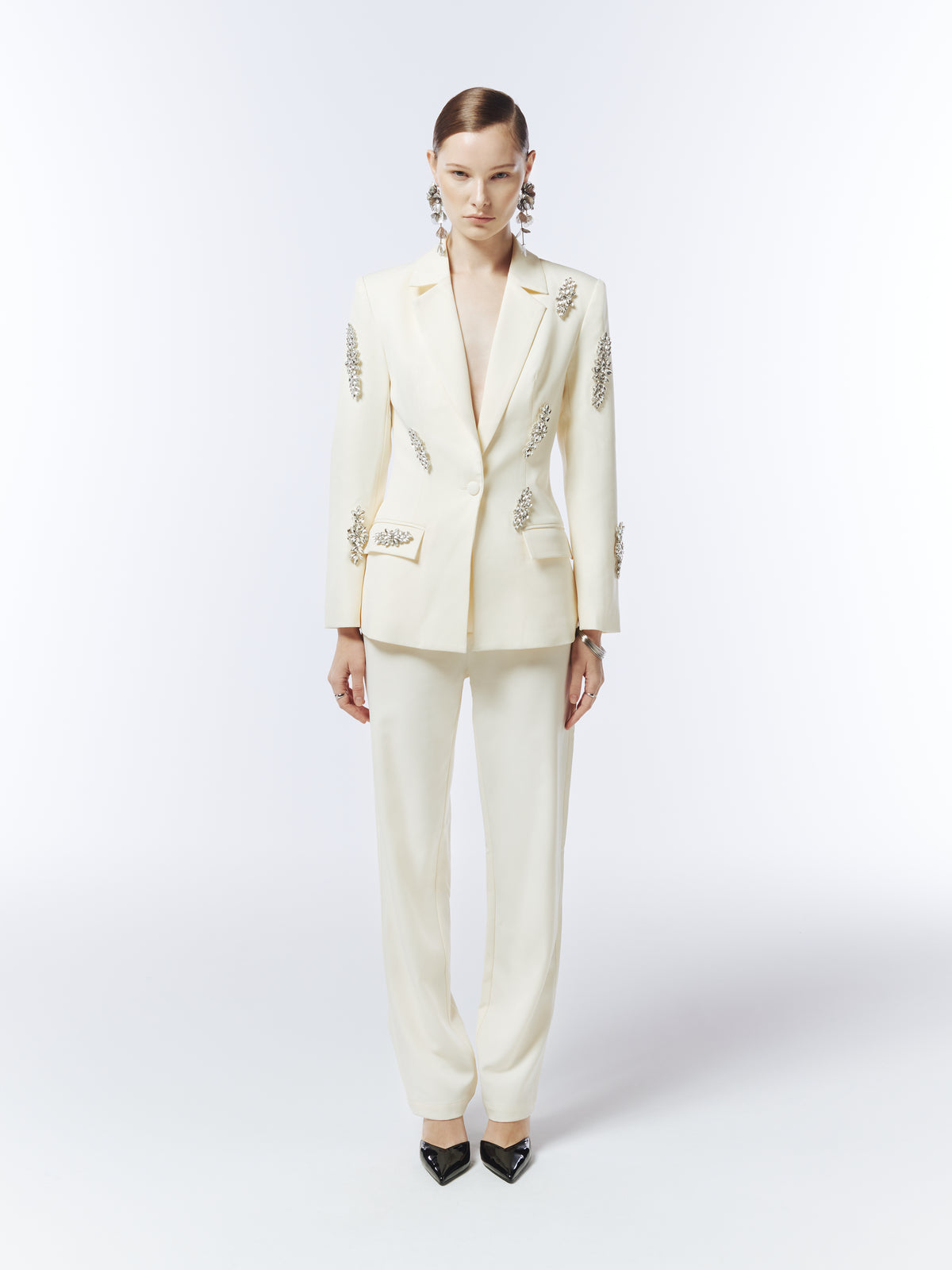Full-length front view of SOUR FIGS soft ivory crystal-embellished blazer styled with matching tailored trousers.